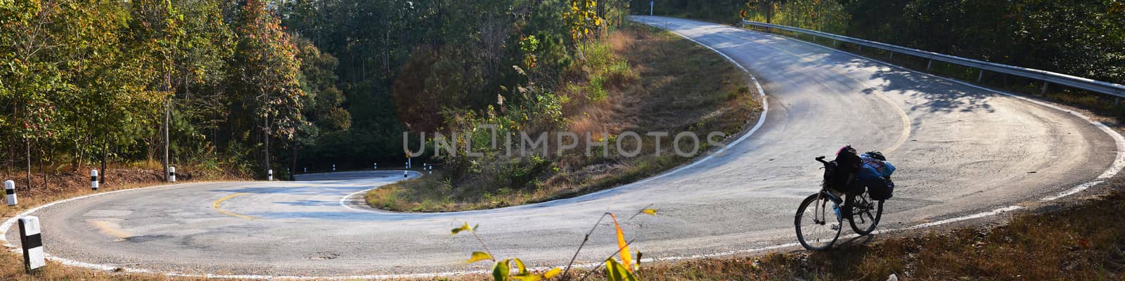 Bicycle on Slope Down Hill Country Asphalt Road no Autocar, Pano by kobfujar