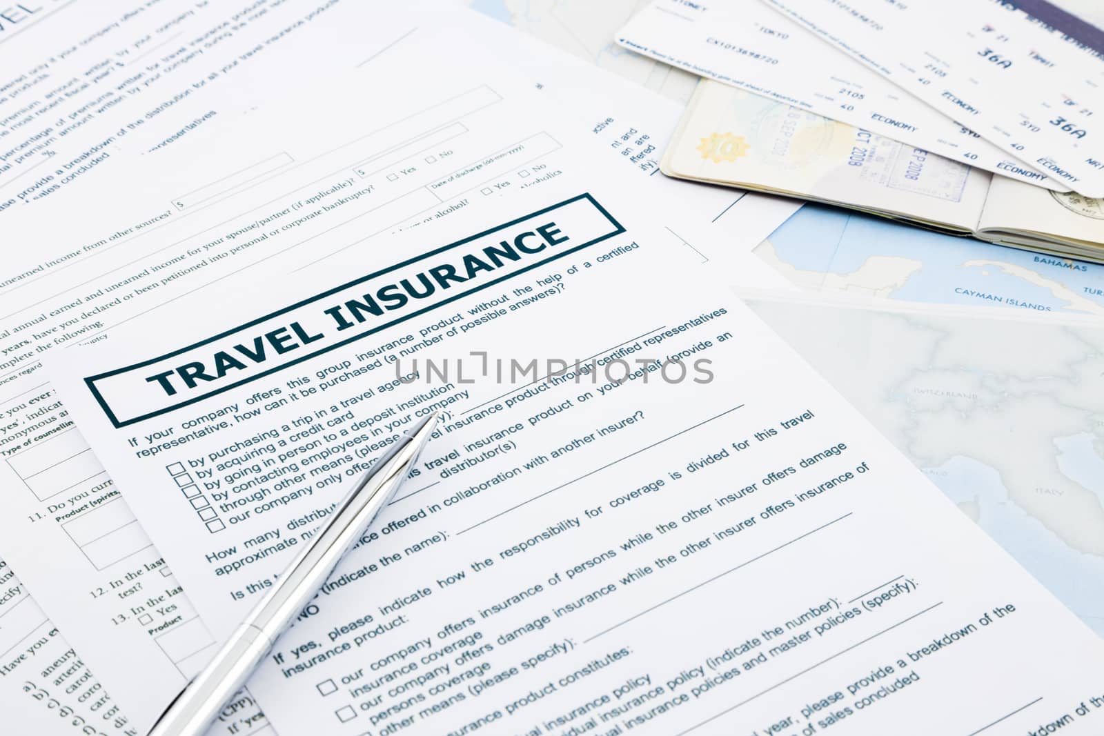 travel insurance form, passport and tickets  by vinnstock