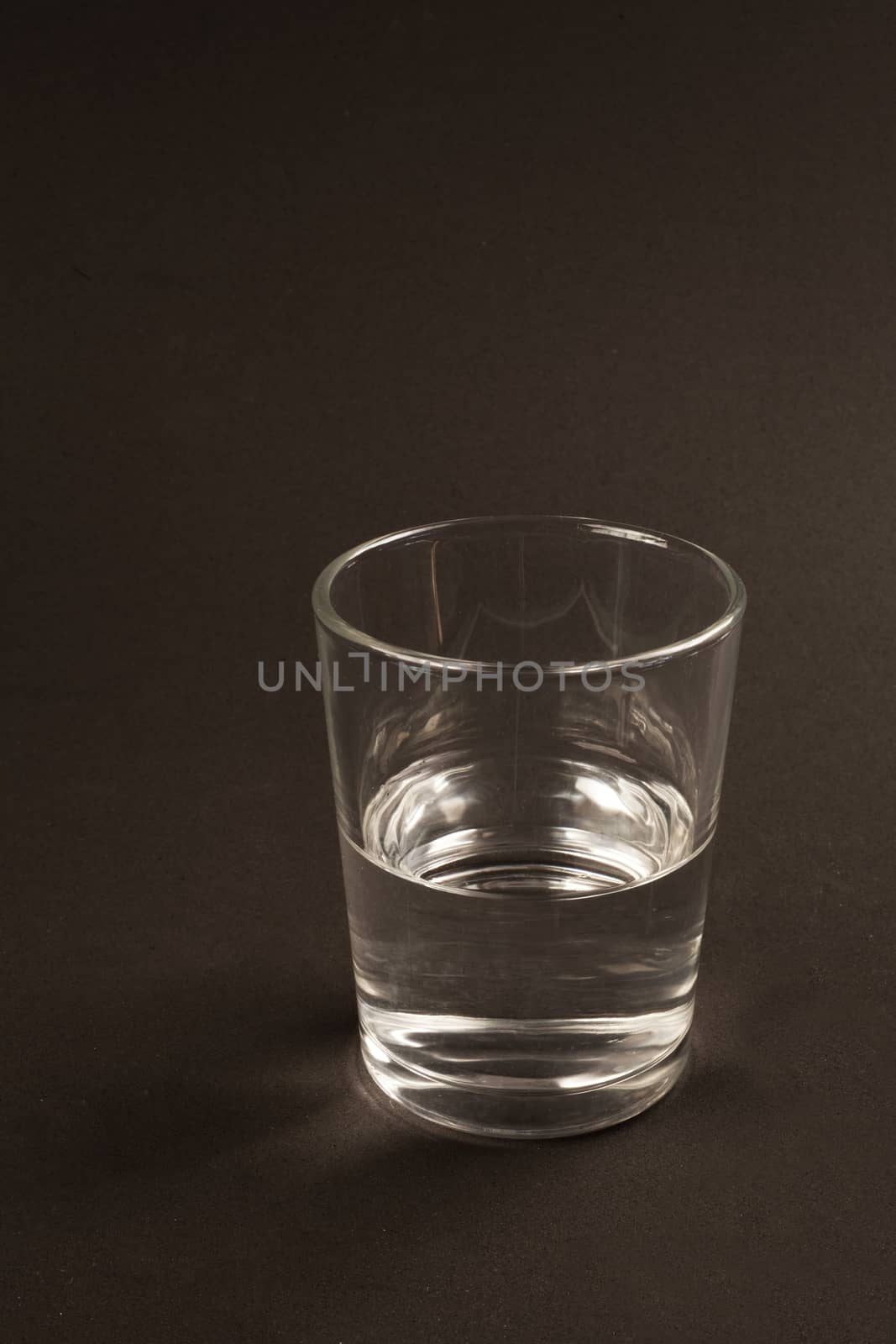 Half full or half empty glass of water by demachy