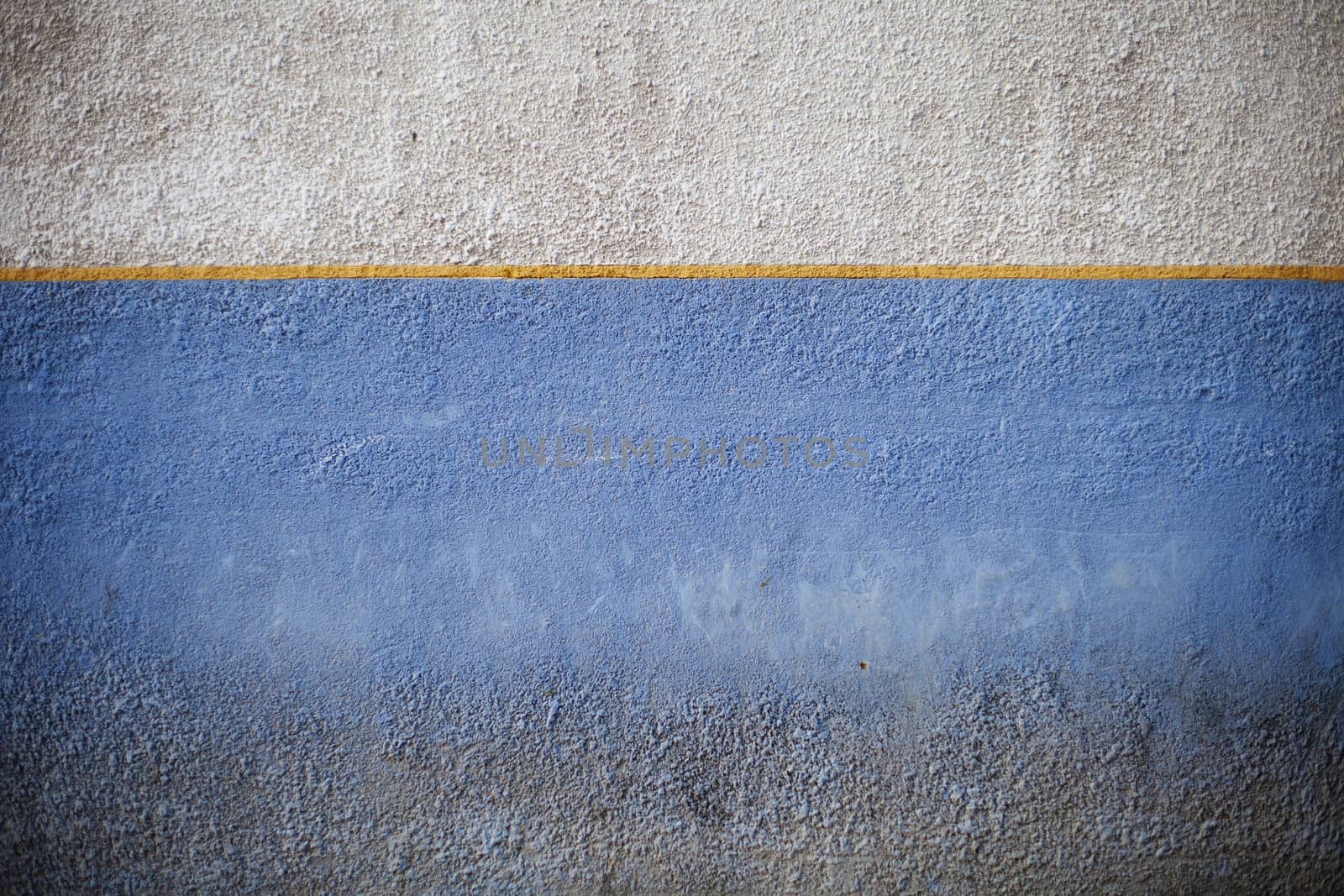Old Textured Blue, Yellow and White Wall