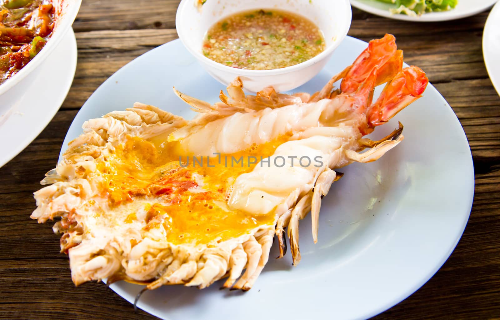 Grilled fresh big shrimp ( Macrobrachium rosenbergii) at Thailand seafood restaurant.