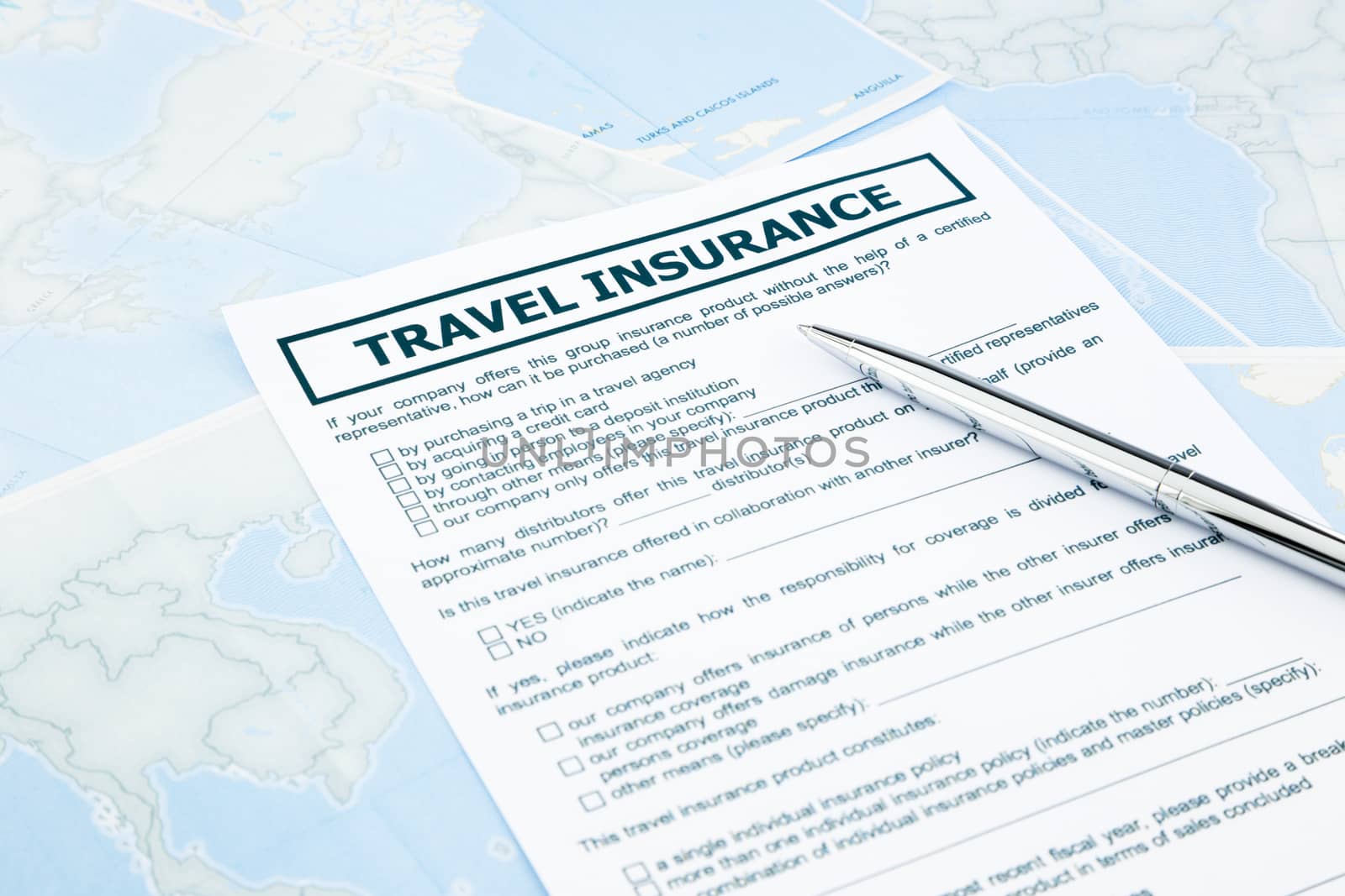 travel insurance form on world map by vinnstock
