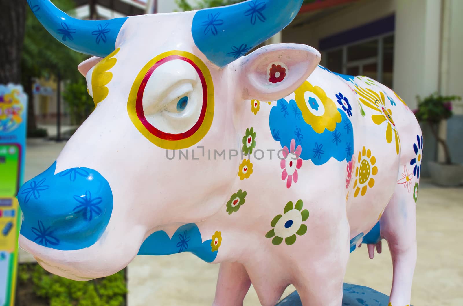 Artificial Cow with Colourful Painting Flowers by kobfujar