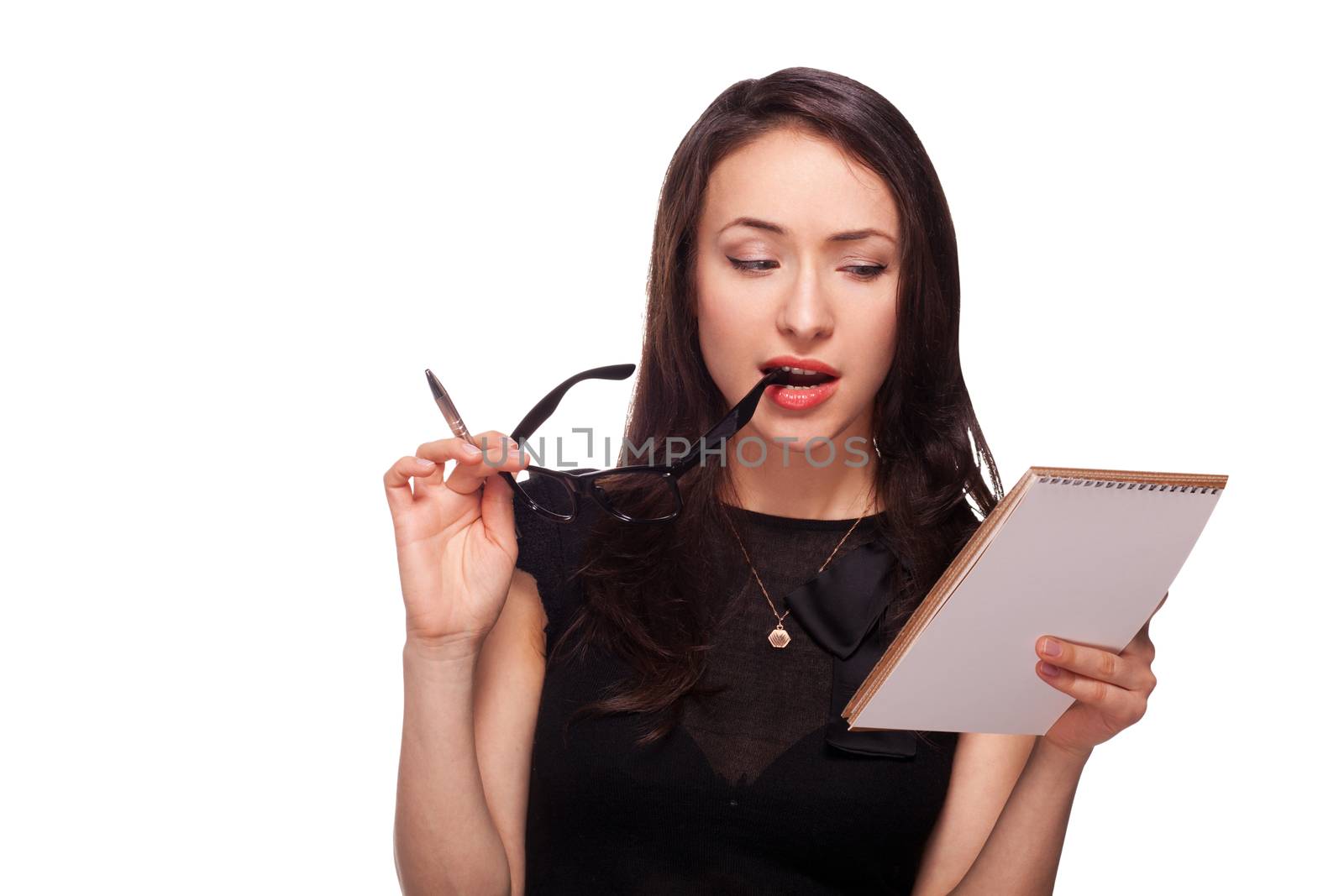 Sexy woman in glasses with notepad isolated on white