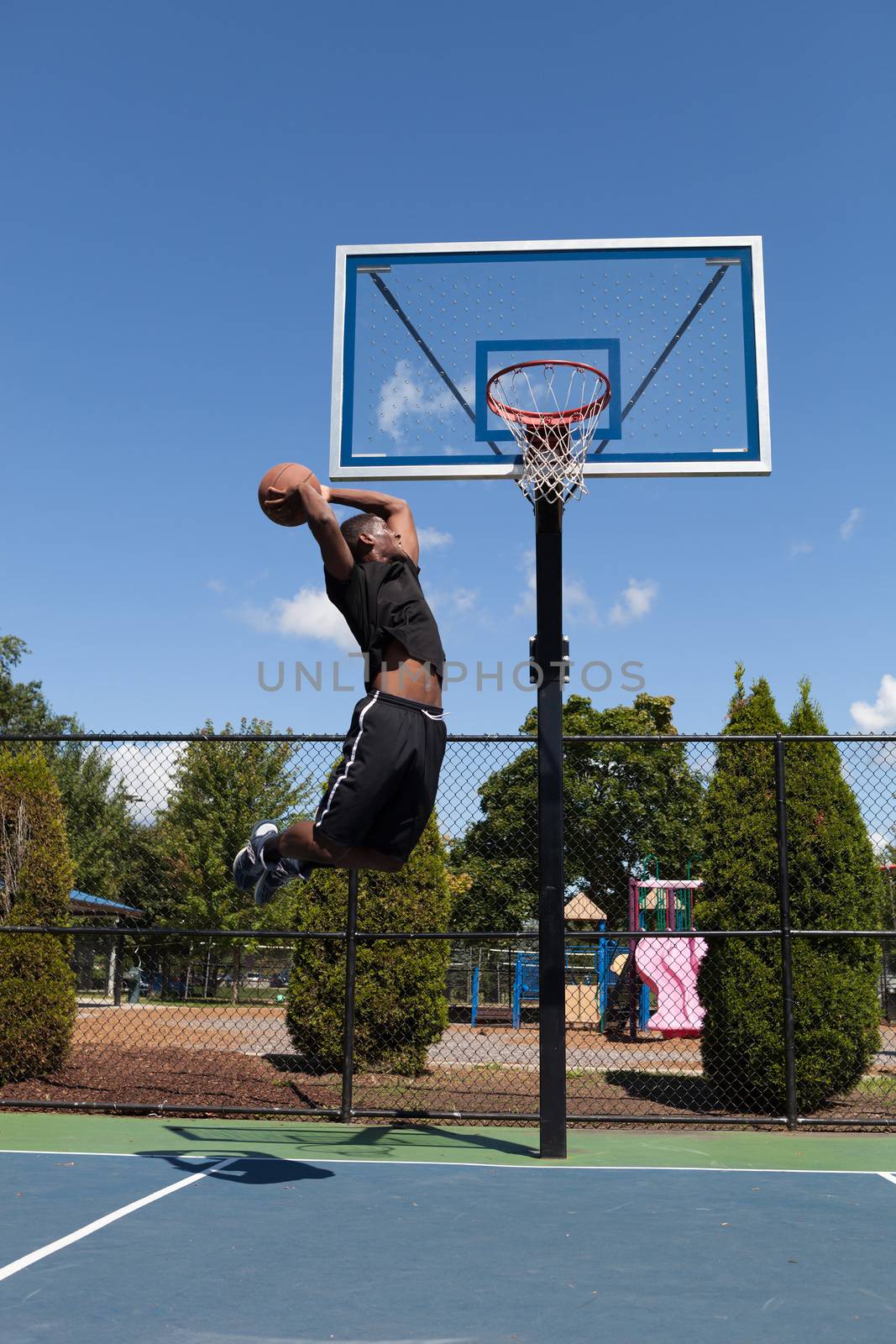 Basketball Player Dunking by graficallyminded
