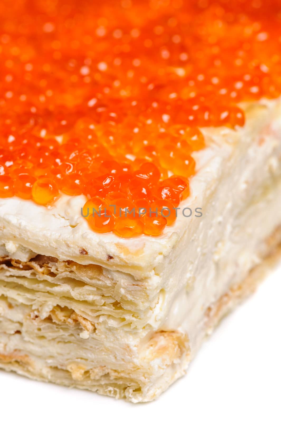 closeup of layered pie made with red caviar
