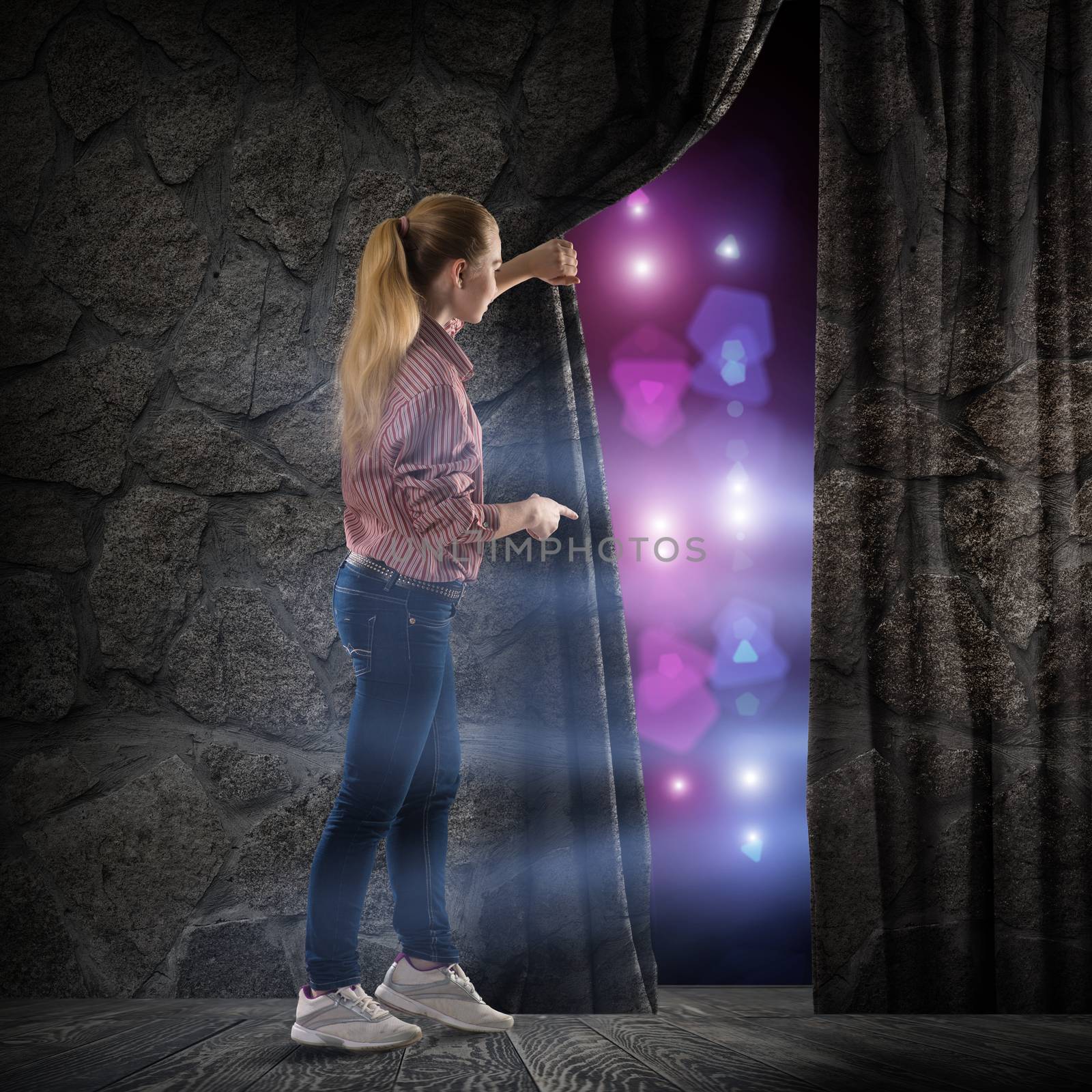 image of a young woman, changes reality, looking at the lights of a stone wall