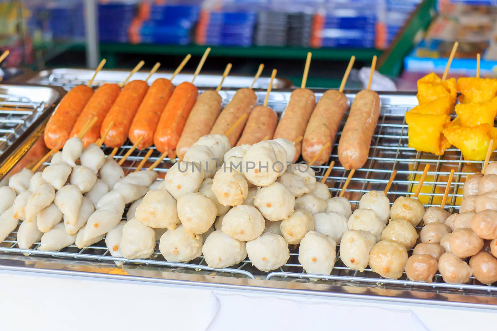 Meatball skewers placed and sold in a variety of markets.