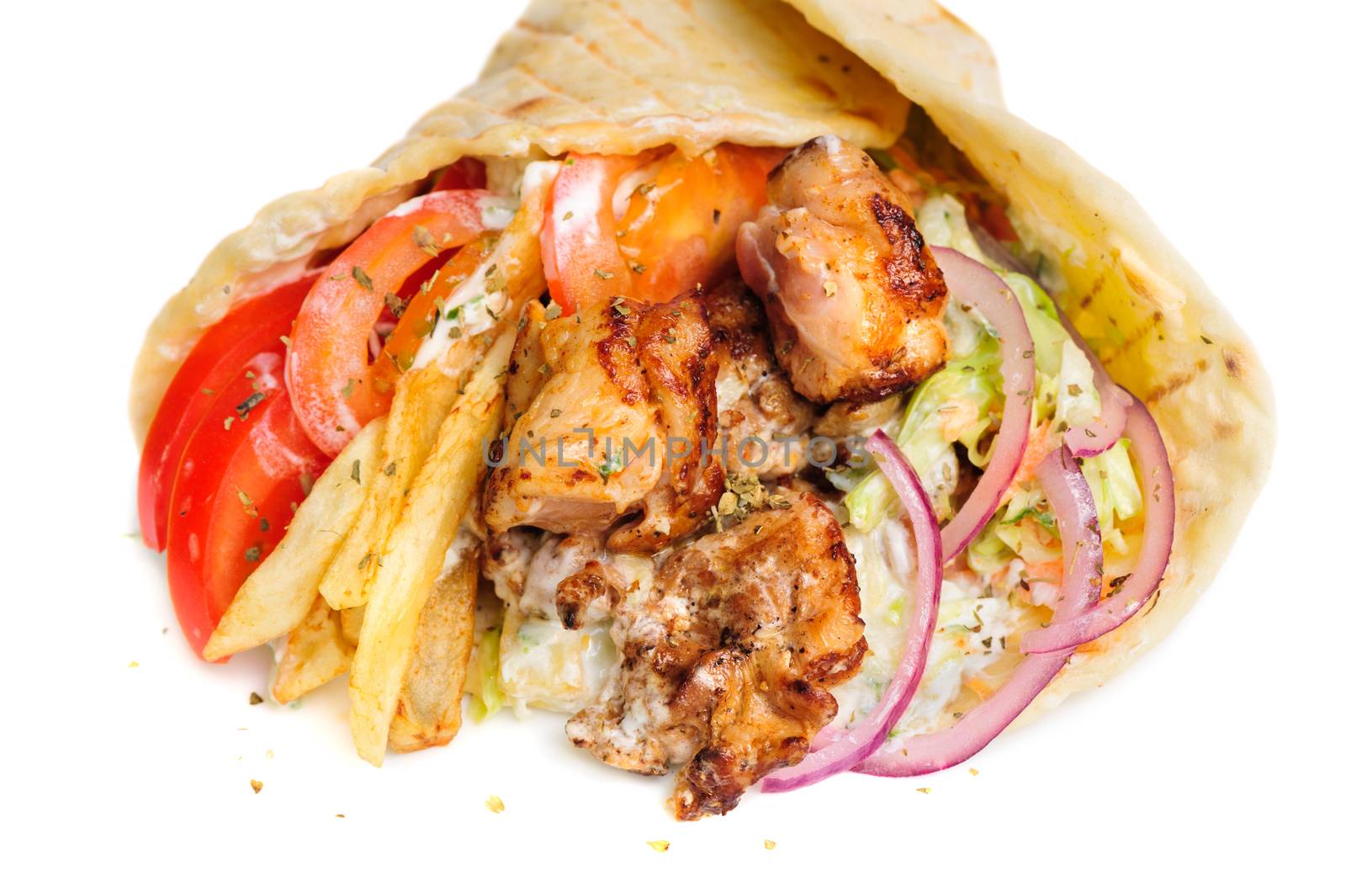 greek gyros stuffed with meat, salad, onion, tomato and potato