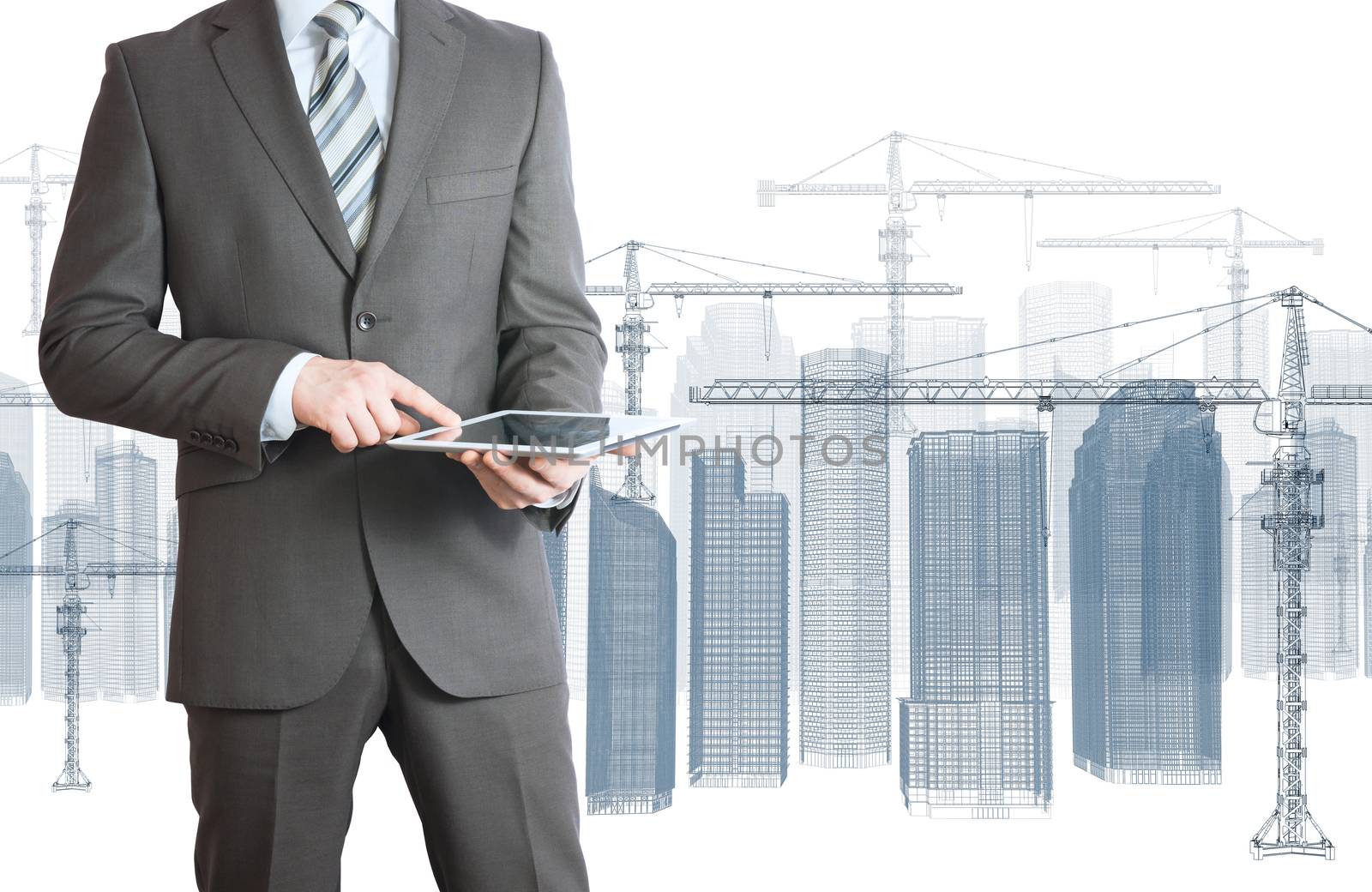 Businessman in suit hold tablet pc by cherezoff