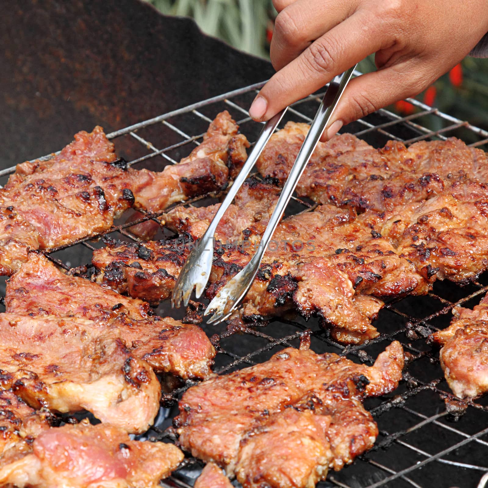 Grilled barbecue pork on the grill