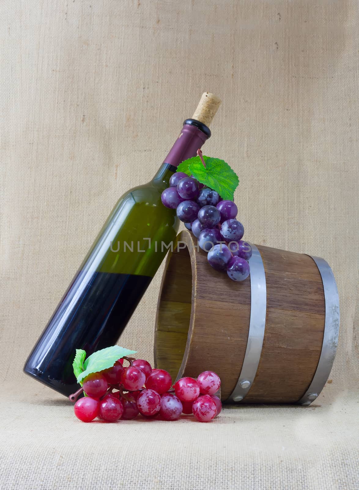 Red wine and grapes in vintage setting