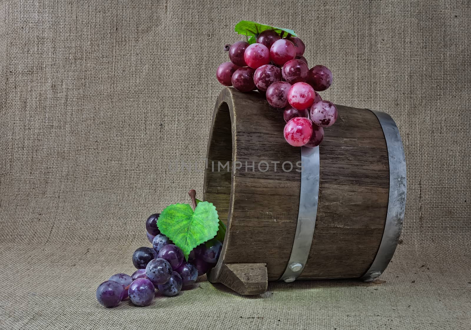grapes on wooden bucket  still life 