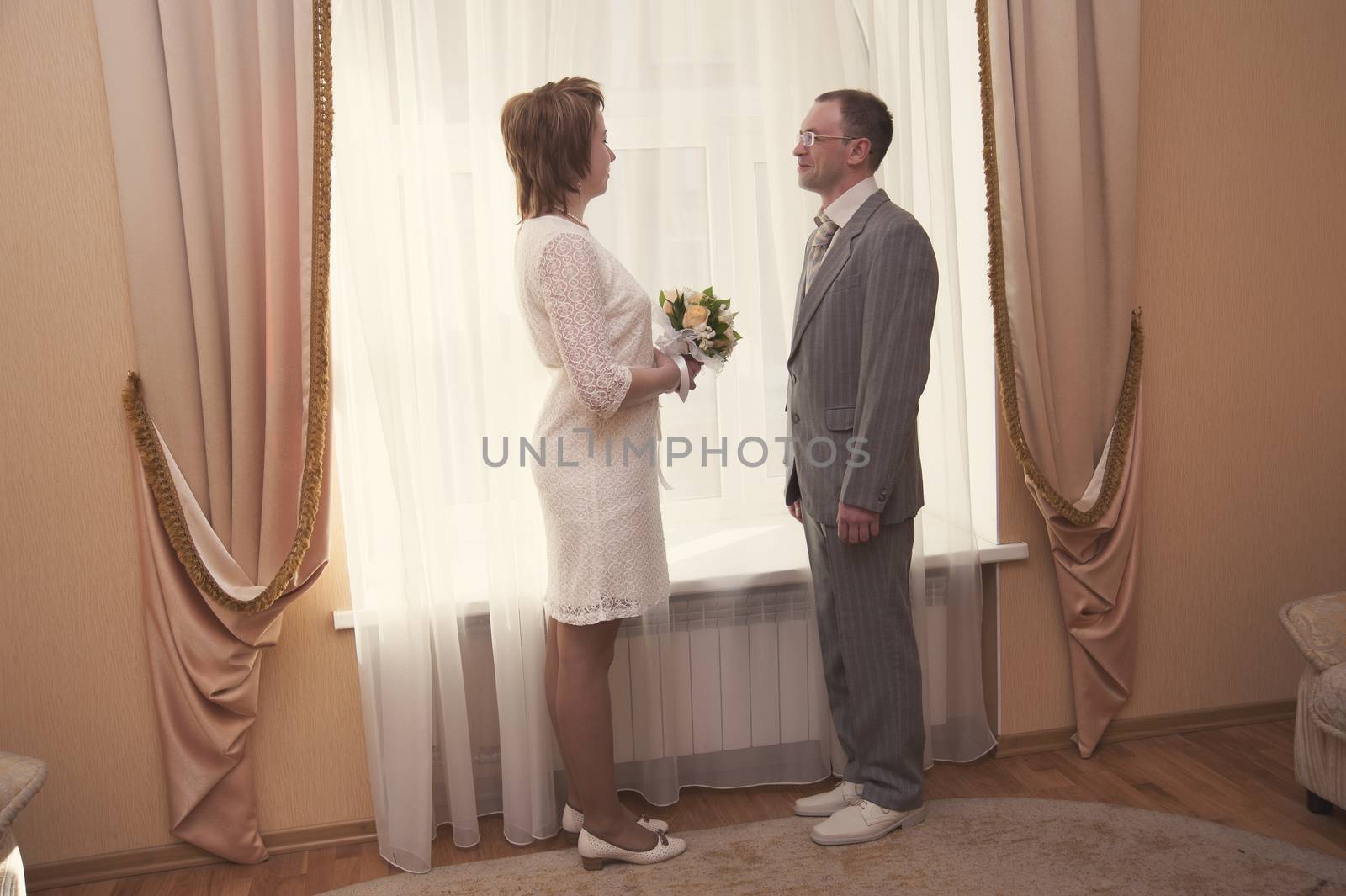 bride and groom are celebrating the wedding interior