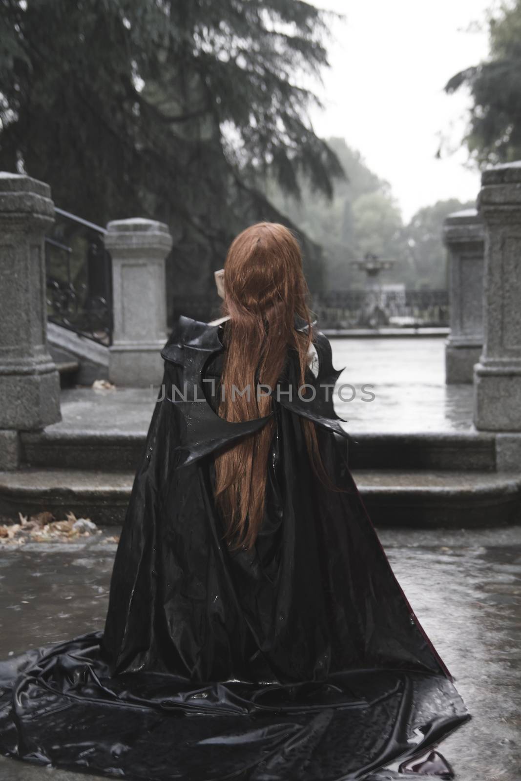Vampire, Dark beauty under rain, red hair woman with long black coat