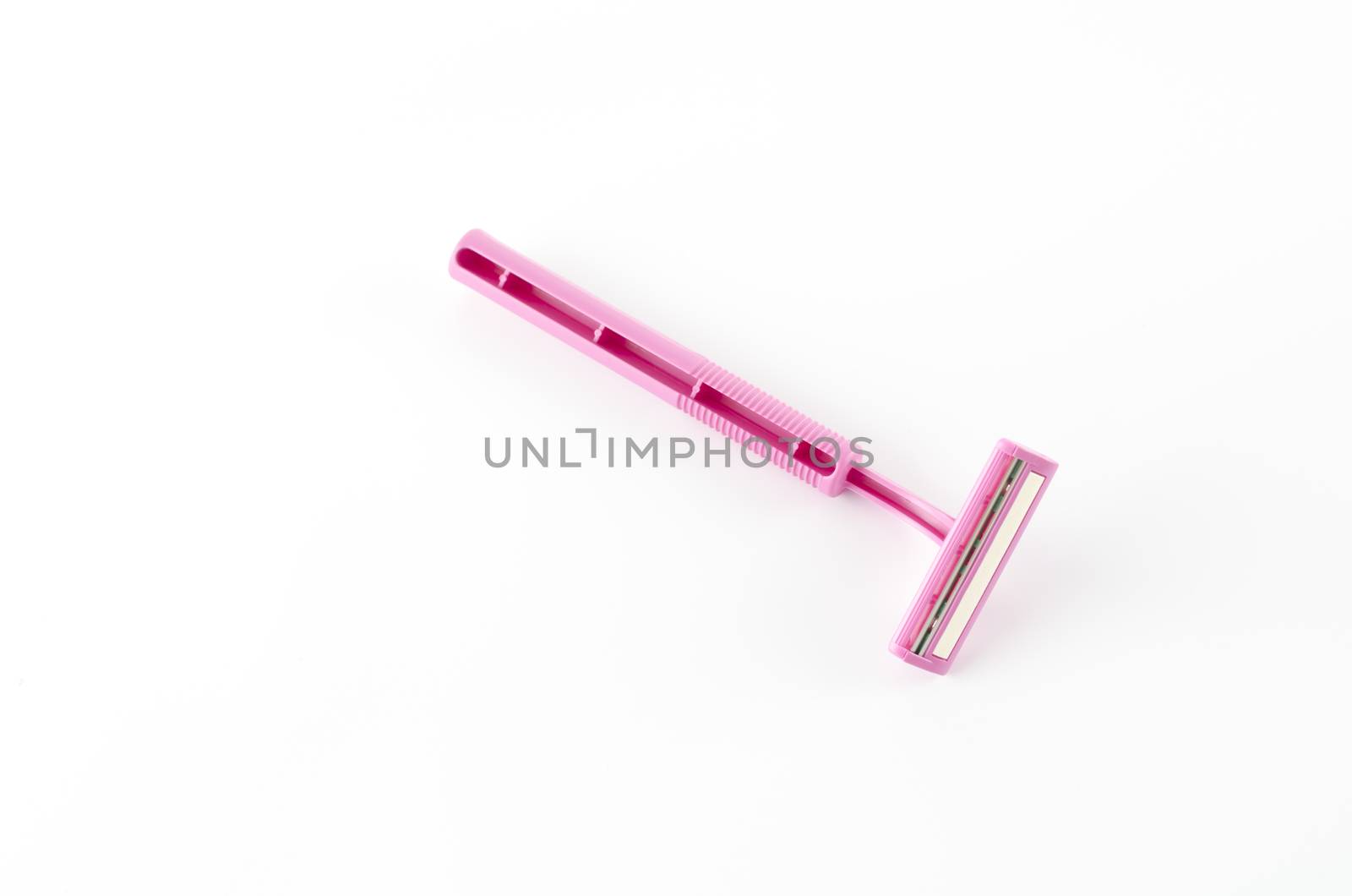 pink disposable shaving on a white background
