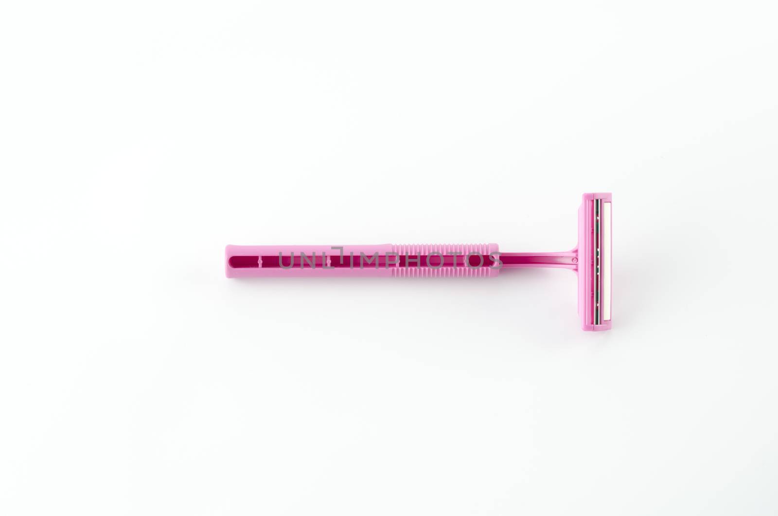 pink disposable shaving on a white background