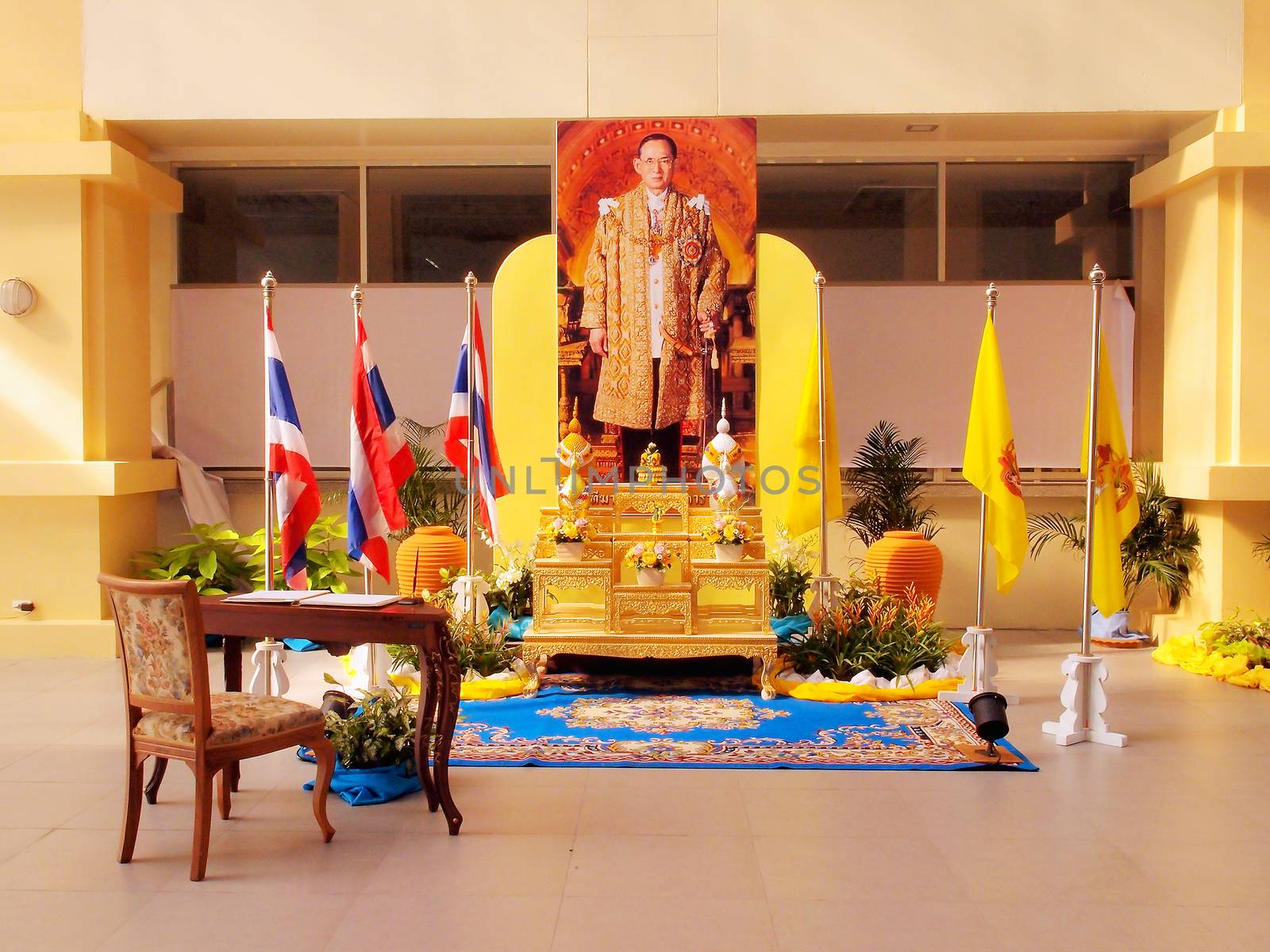 BANGKOK - DECEMBER 20 :Decoration picture of King and table for Thai people sign get-well messages for HM King Bhumibol Adulyadej at Central Chest Hospital on December 20, 2013 in Bangkok, Thailand.