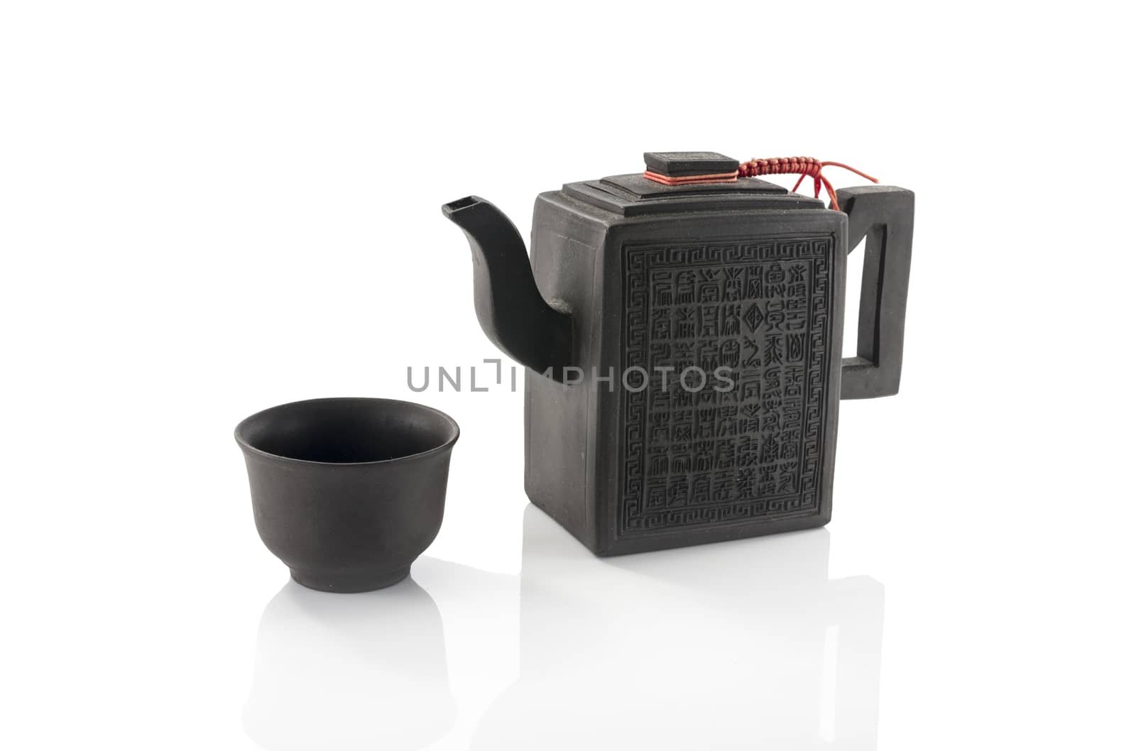 asian teapot and cup isolated on white
