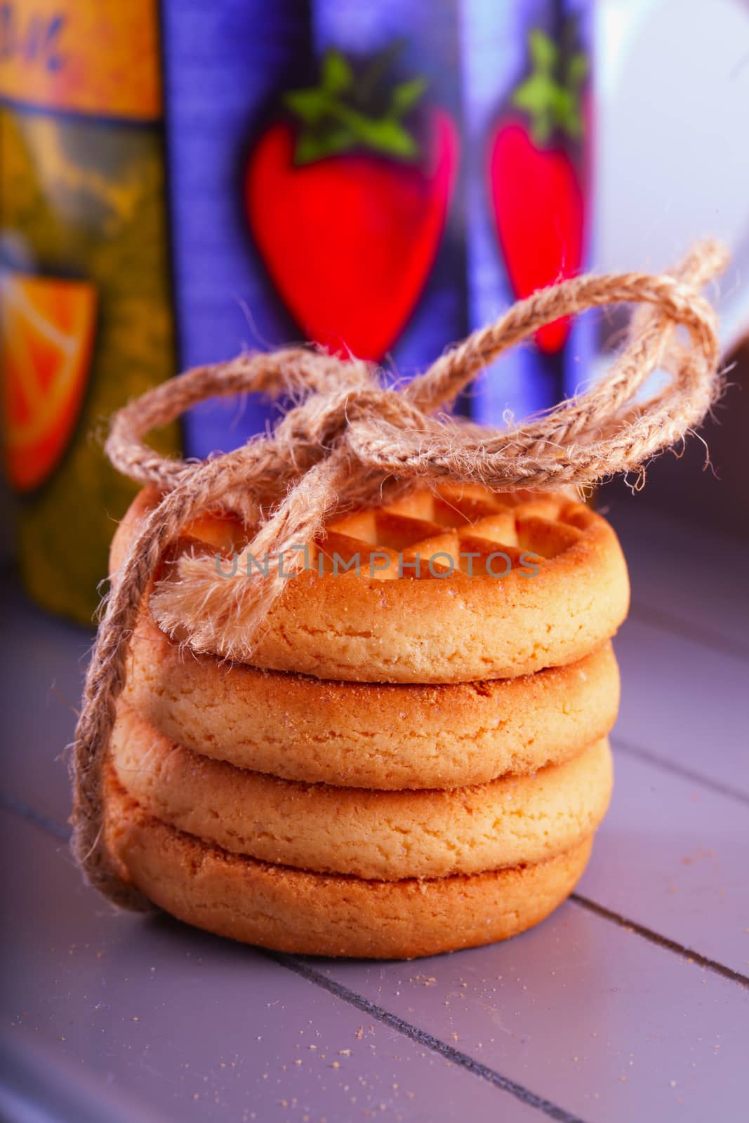 Four biscuits in a pack bound with a rope