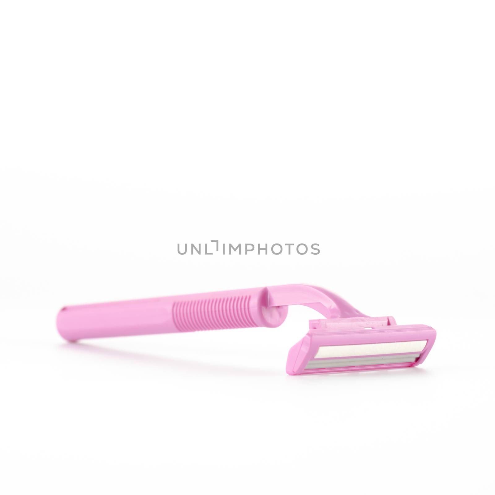 pink disposable shaving on a white background