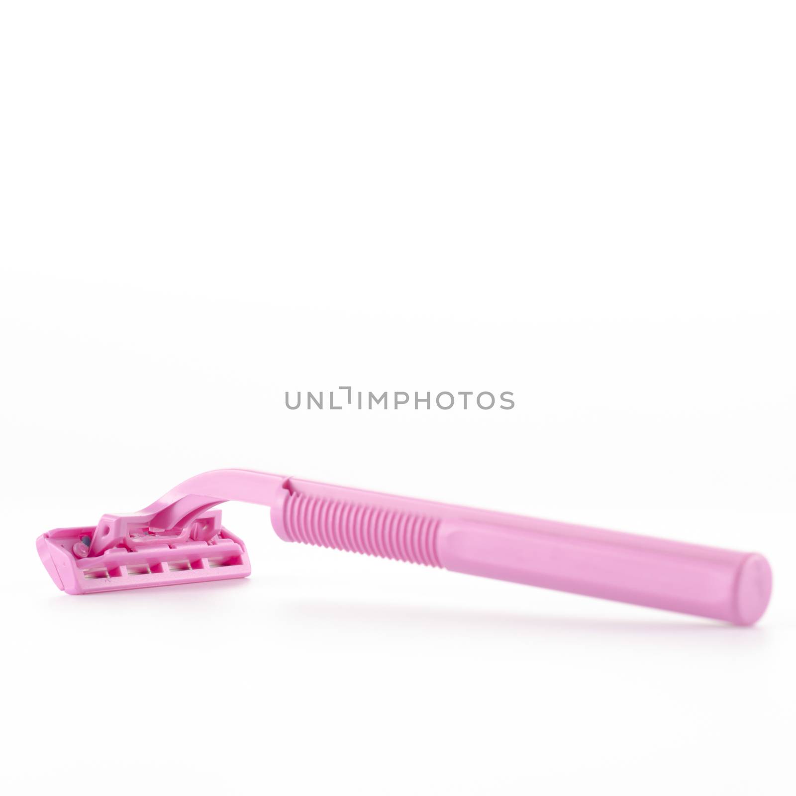 pink disposable shaving on a white background