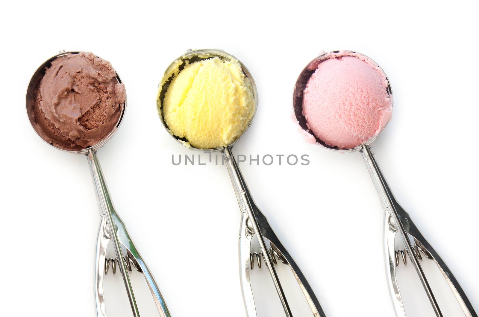 Different flavors of ice cream over a white background 