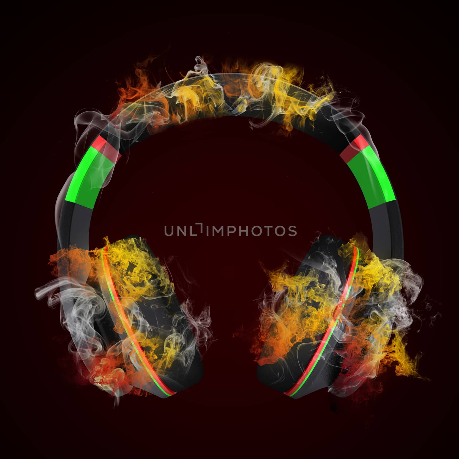 Headphones in the colored smoke. Concept of sound