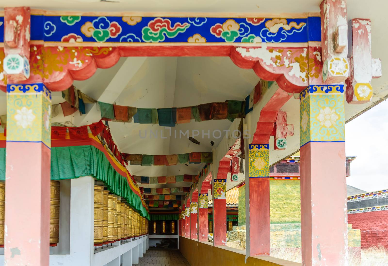 The prayer wheels inside Lharong Monastery in Sertar, Tibet.  Lharong Monastery is a Tibetan Buddhist Institute at an elevation of about 4000 meters.