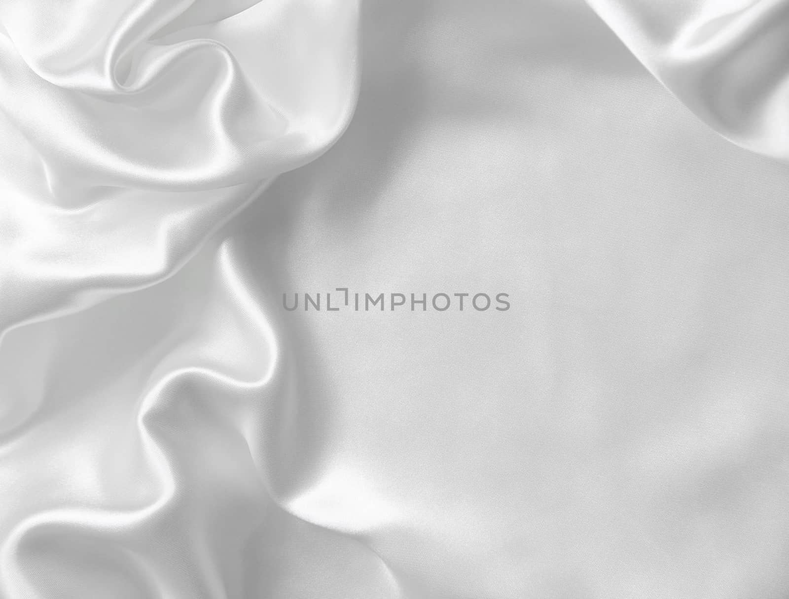 Smooth elegant white silk can use as wedding background 