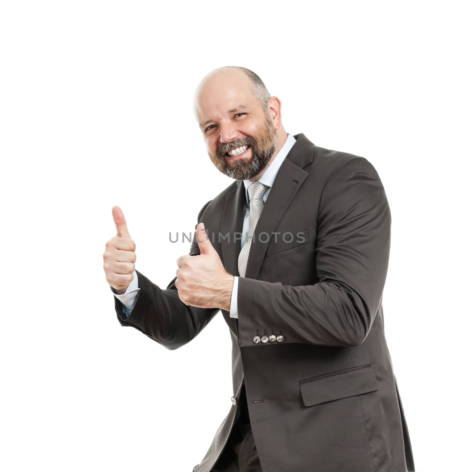 An image of a handsome business man with his thumbs up
