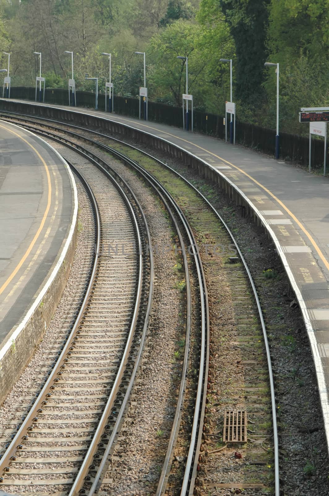 deserted railroad platform on a bend