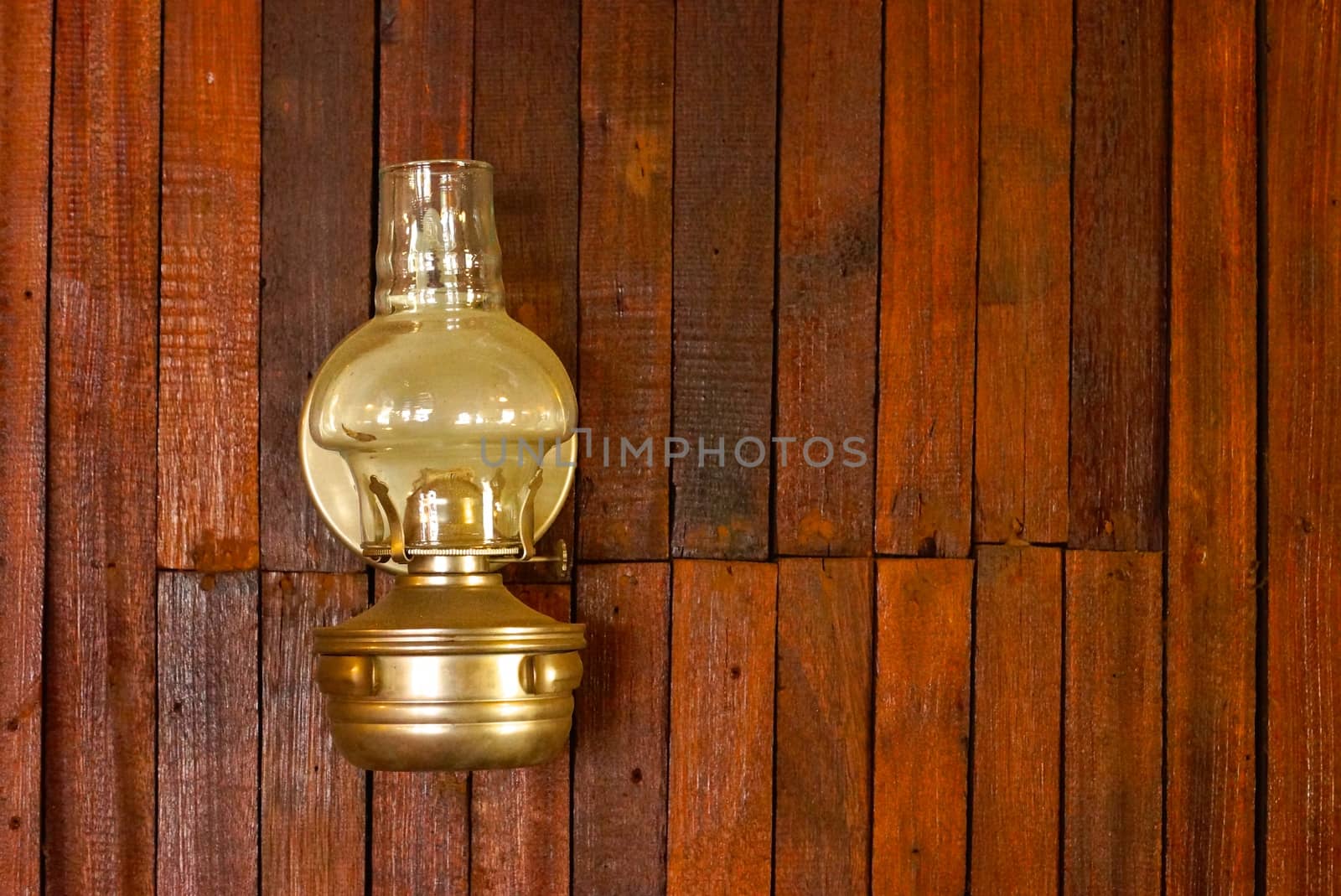 retro style lantern hanging on wooden wall,shallow focus