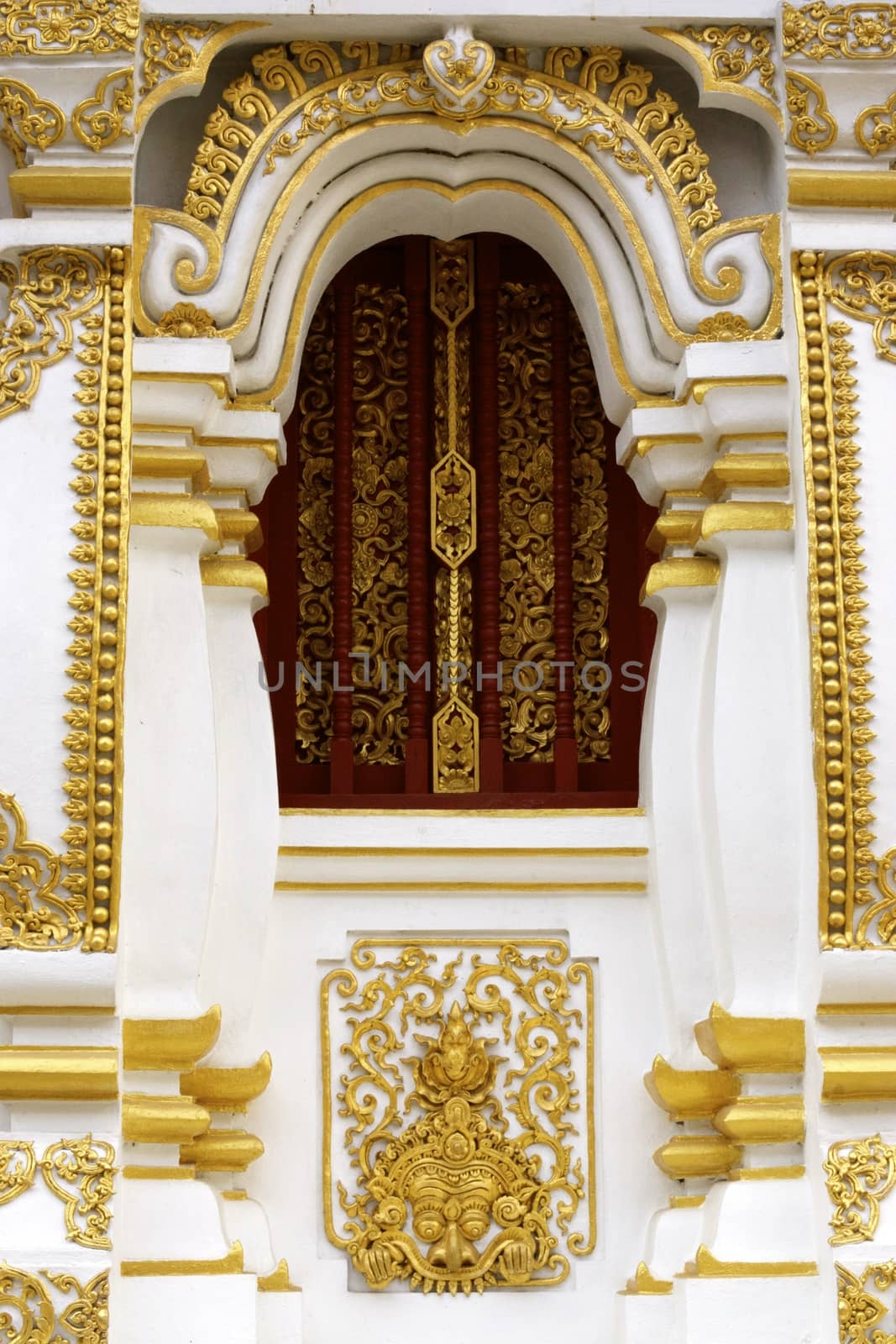 stucco work in thai art that usually decorated with mirror and precious stone or gold leaf,Chiang rai temple,Thailand