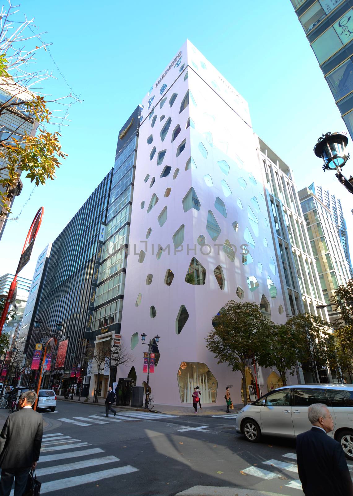 GINZA, JAPAN - NOV 26 : Modern building in Ginza area on November 26, 2013 in Tokyo. Ginza shopping area. The popular tourist spot in Tokyo. 