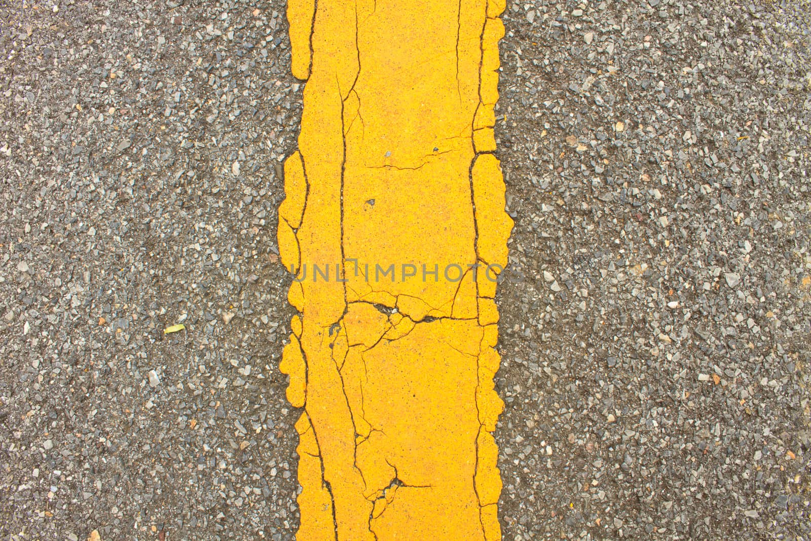 Asphalt dark texture with yellow lines