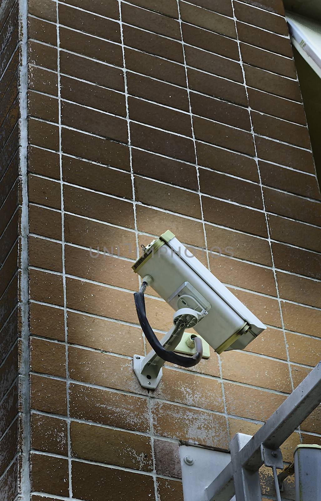The CCTV camera secure monitor set on the wall to watch and record anything.