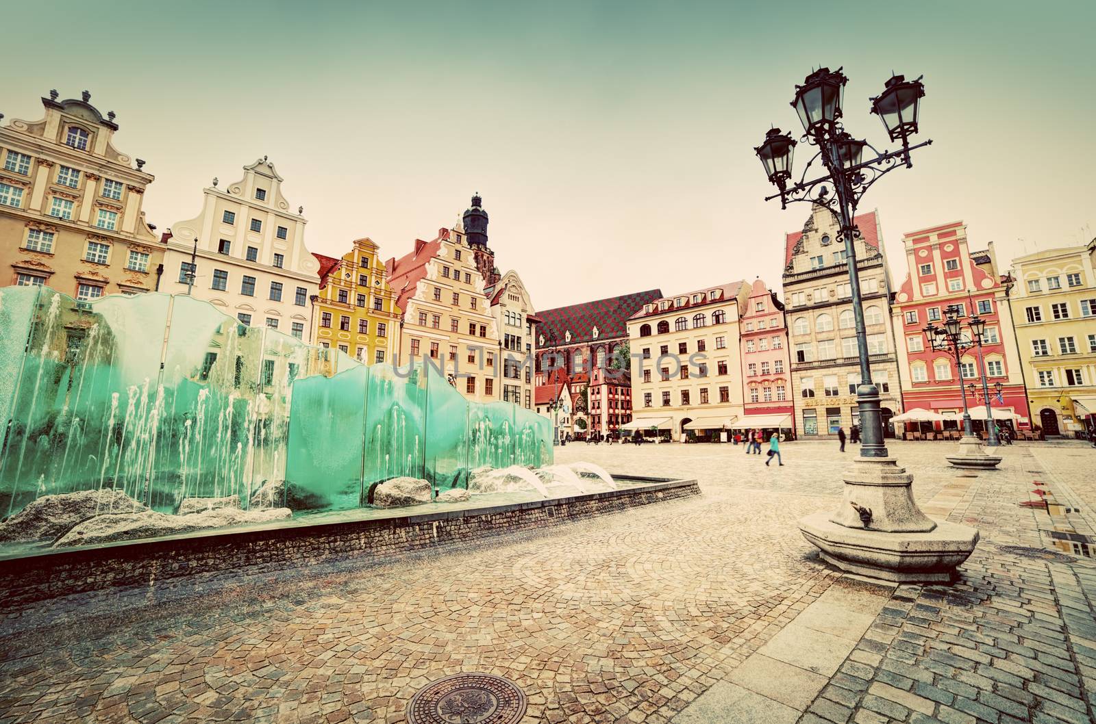 Wroclaw, Poland. The market square with the famous fountain by photocreo