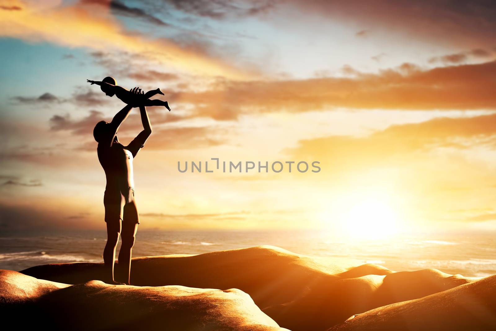 Happy father celebrating his little child by the seaside at sunset, summer time by photocreo