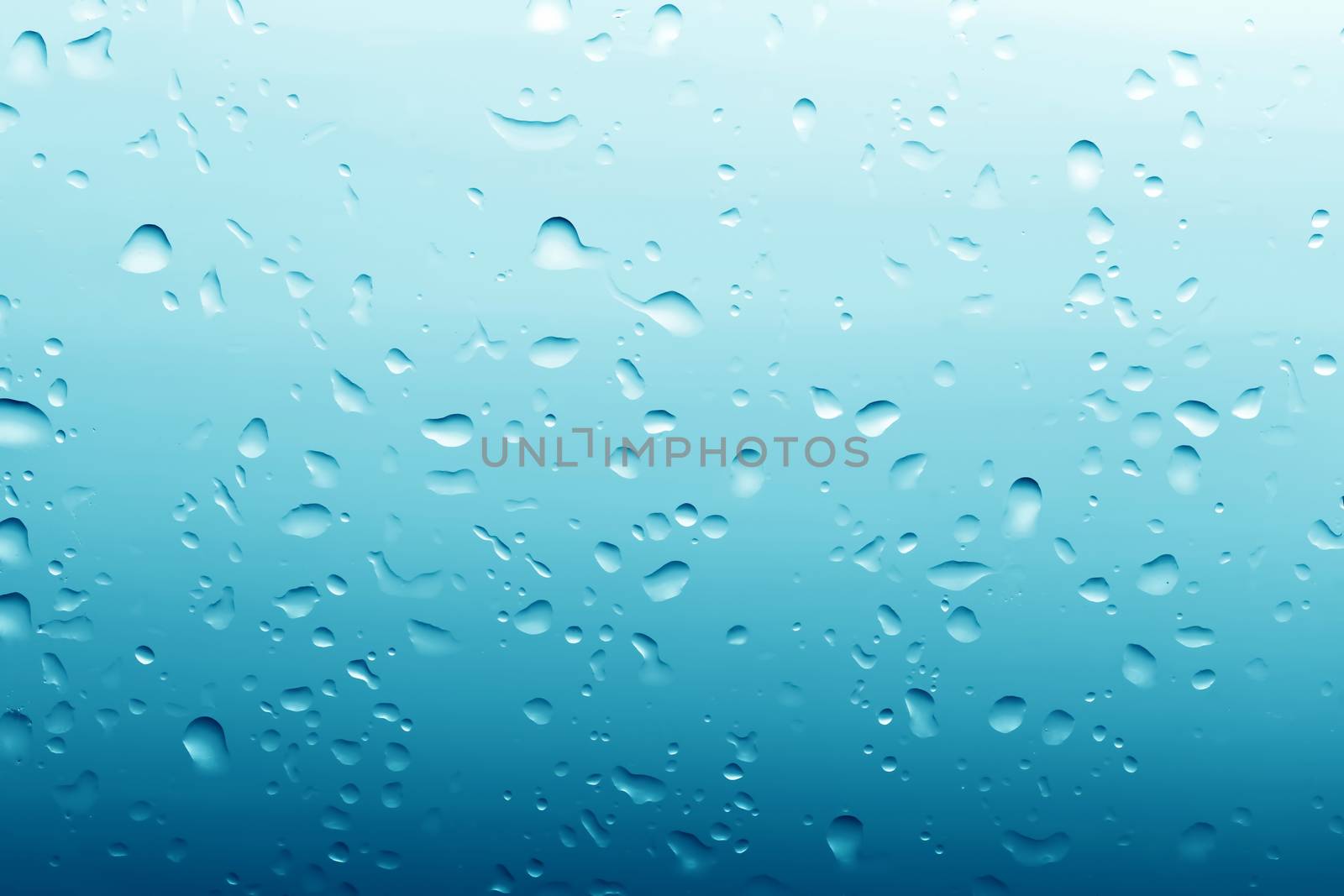 Water drops on clean glass blue background. Ultimate pattern, high resolution.