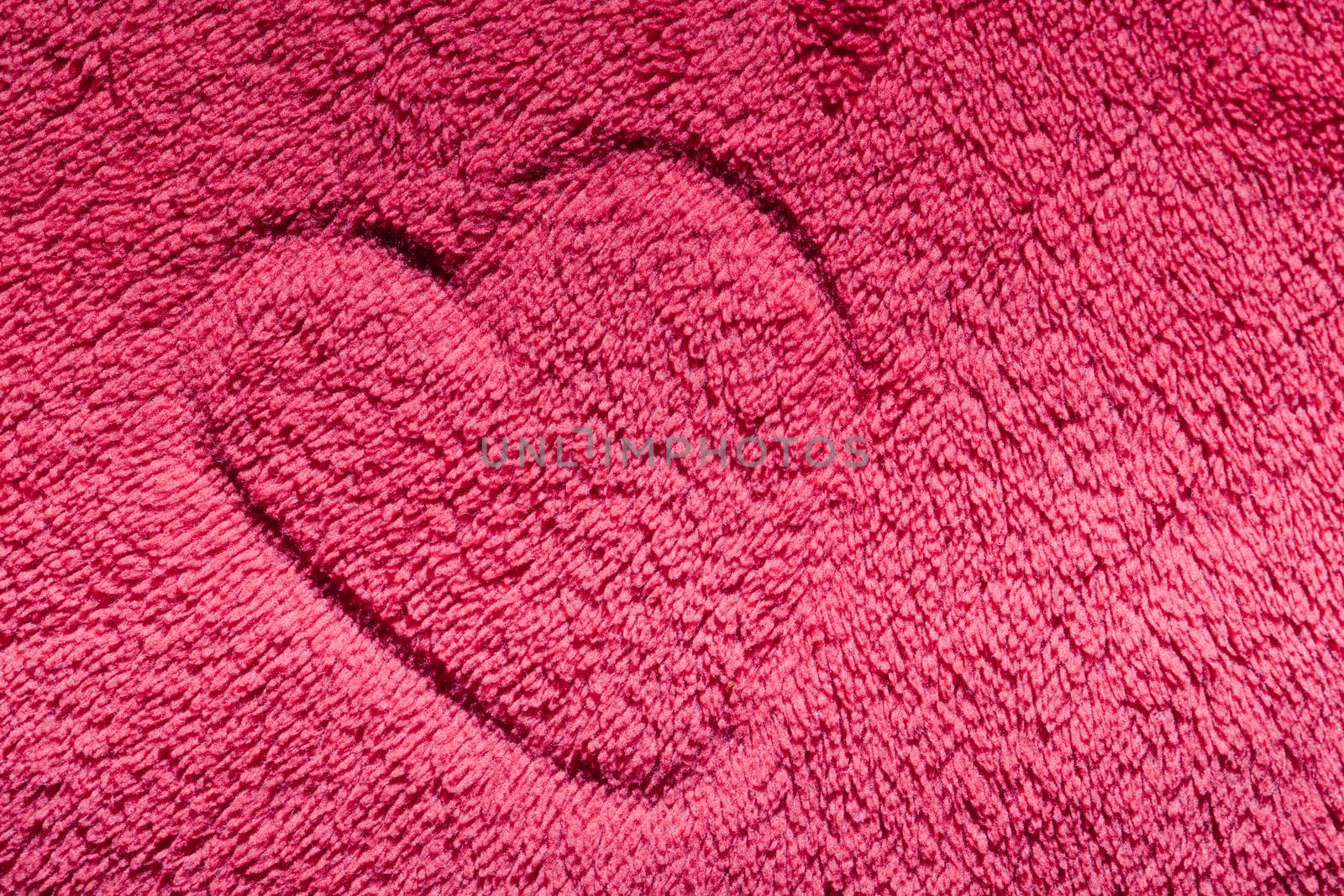 Heart on red furry cloth, pillow. Love, Valentine's Day background