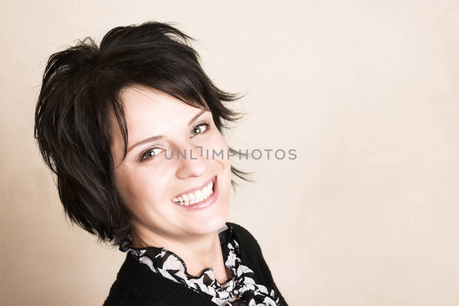 Studio shot of female brunette, head and shoulders