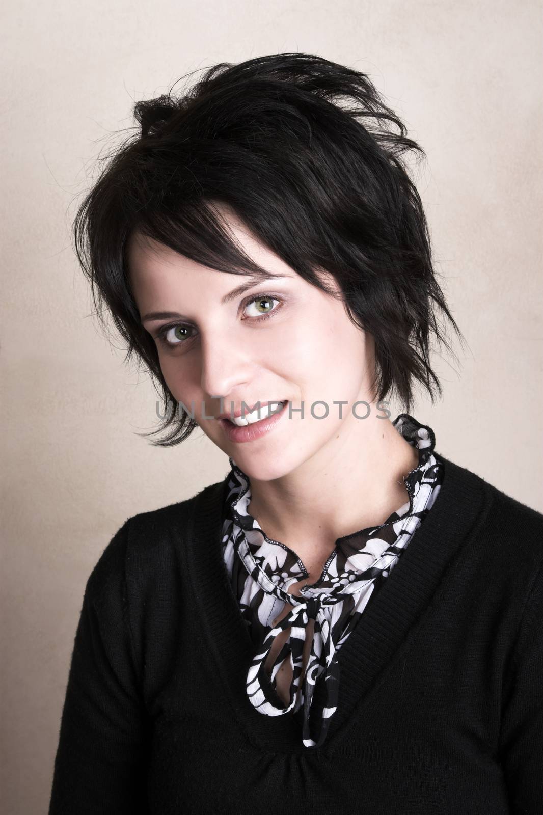 Studio shot of female brunette, head and shoulders