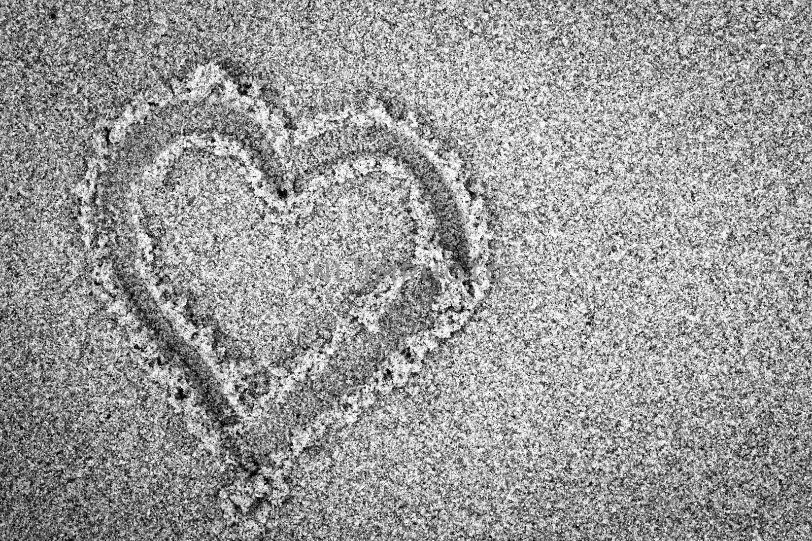 Heart shape on sand. Romantic, black and white by photocreo