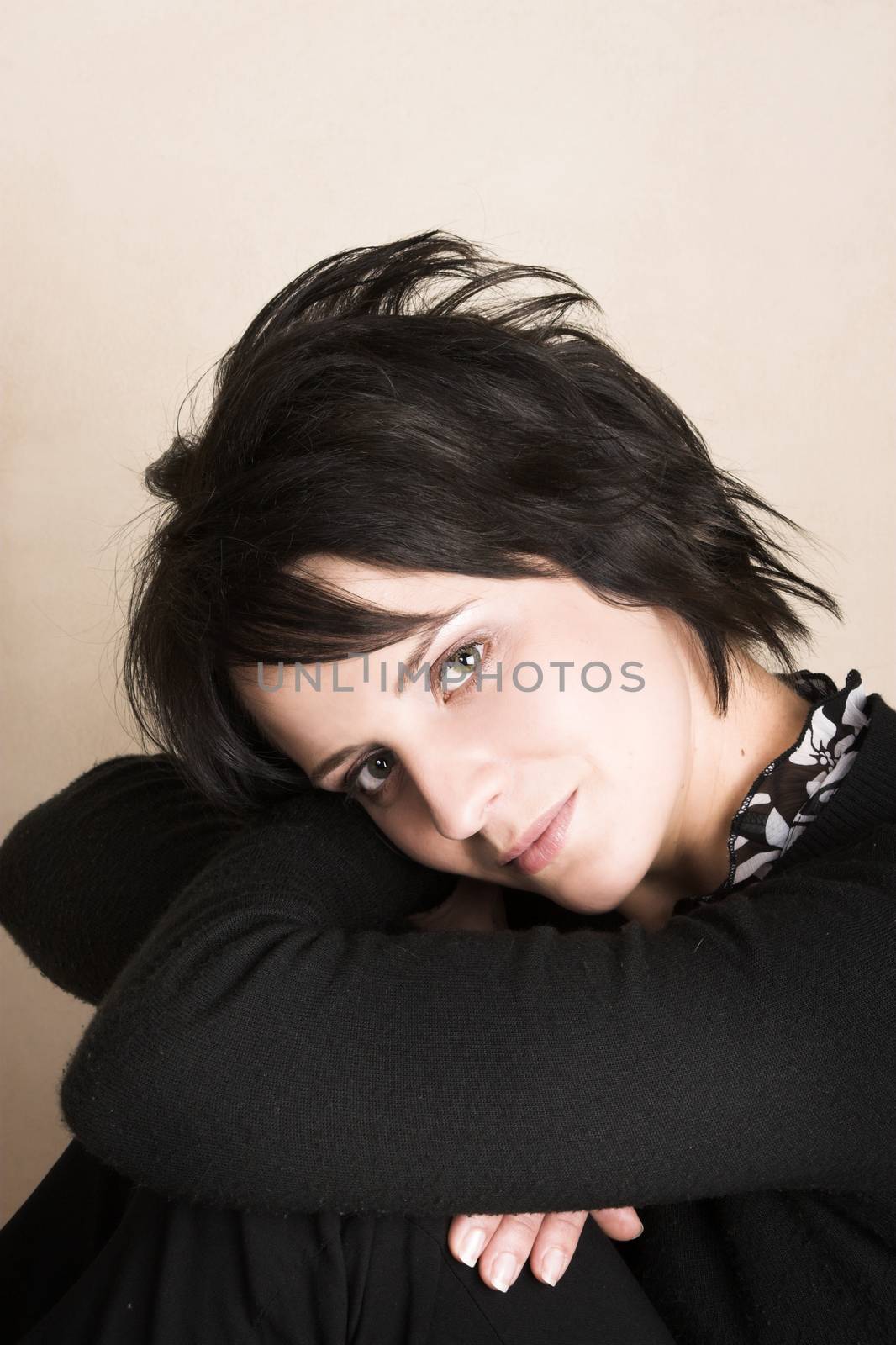 Studio shot of female brunette, head and shoulders