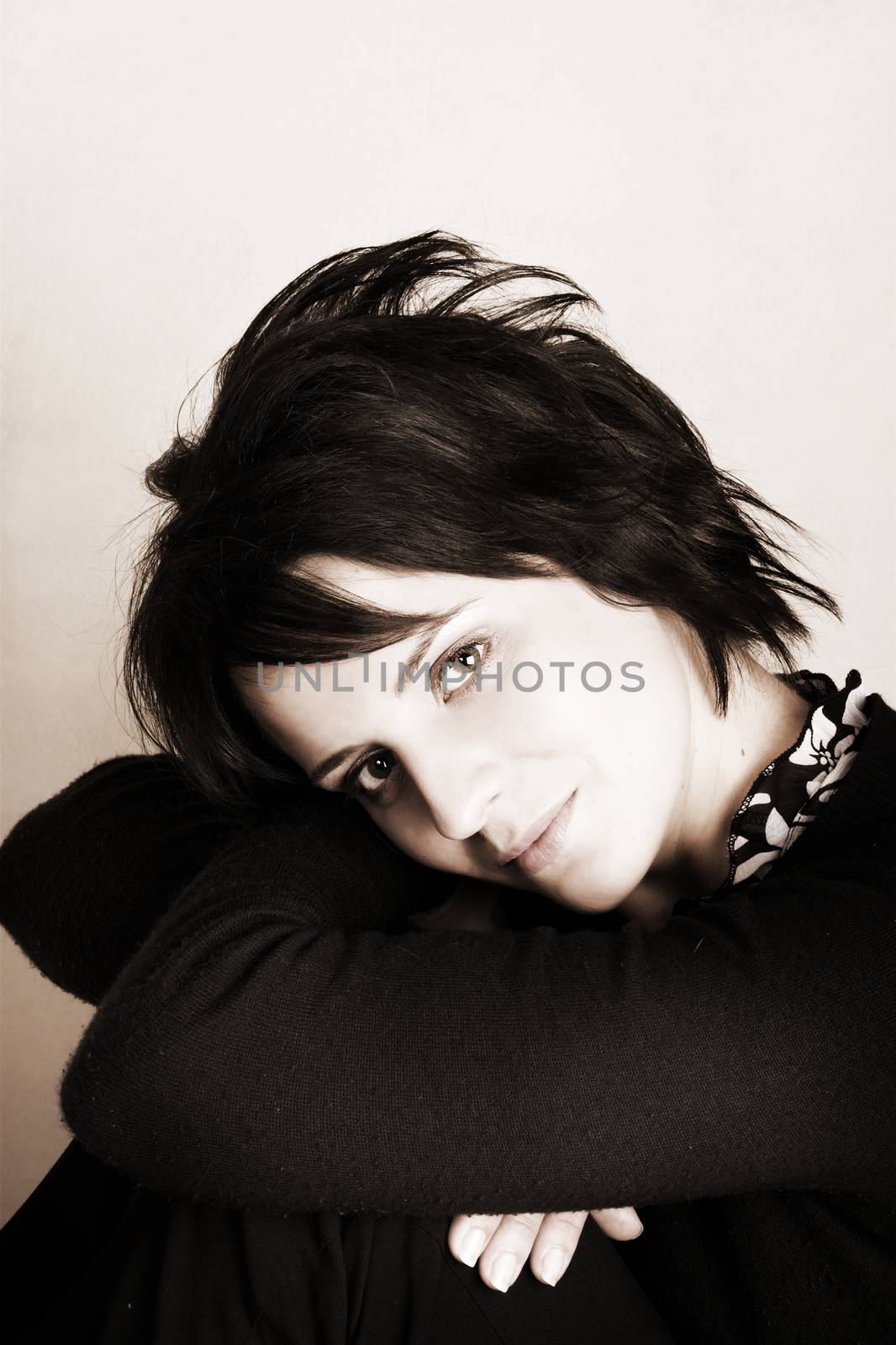 Studio shot of female brunette, head and shoulders