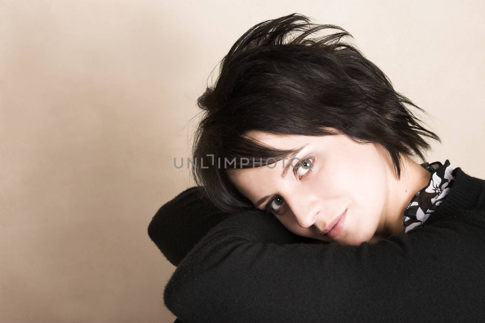 Studio shot of female brunette, head and shoulders