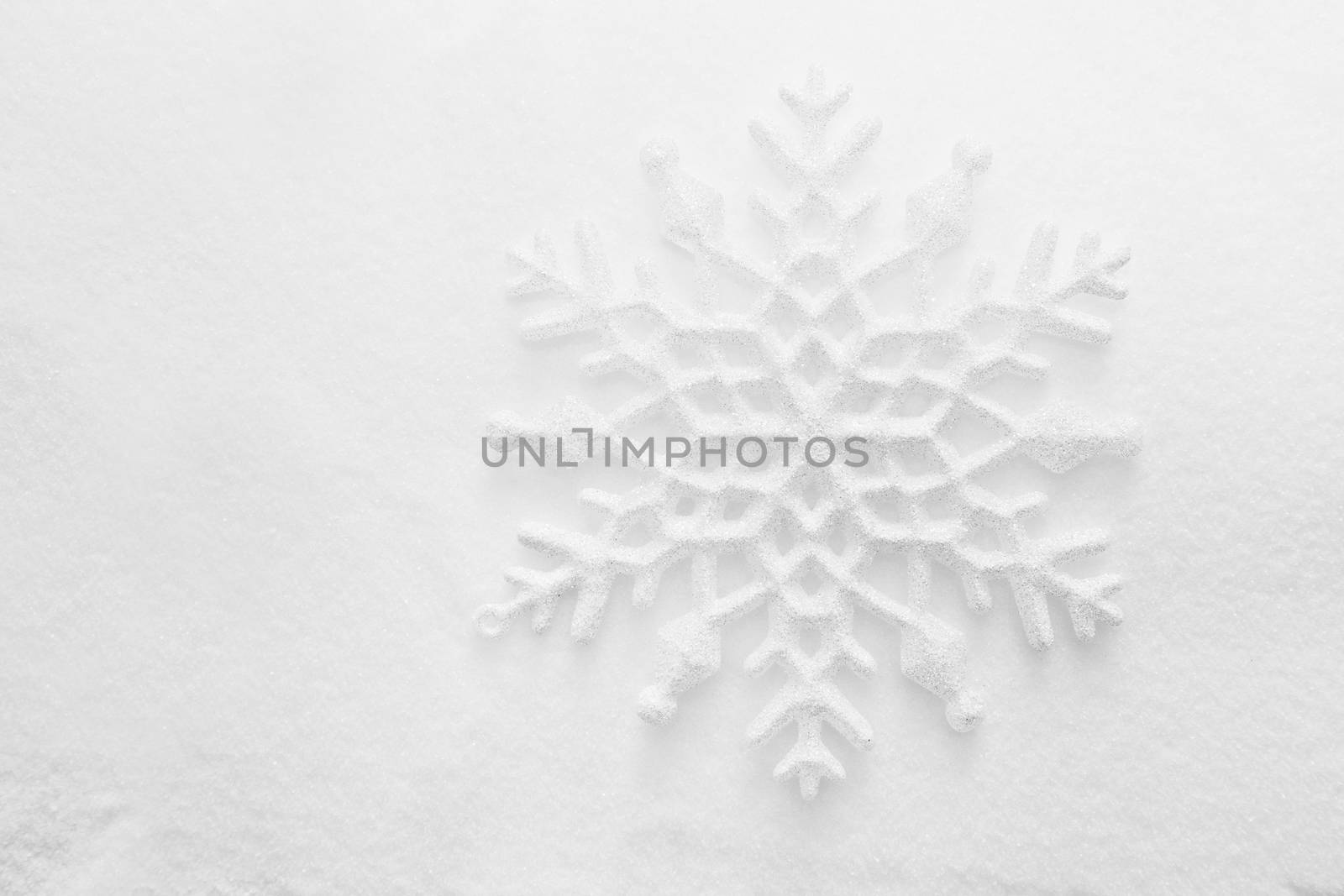 Winter, Christmas background. Snowflake on snow by photocreo