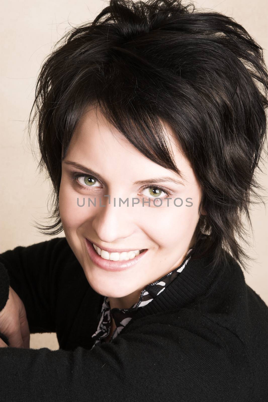 Studio shot of female brunette, head and shoulders