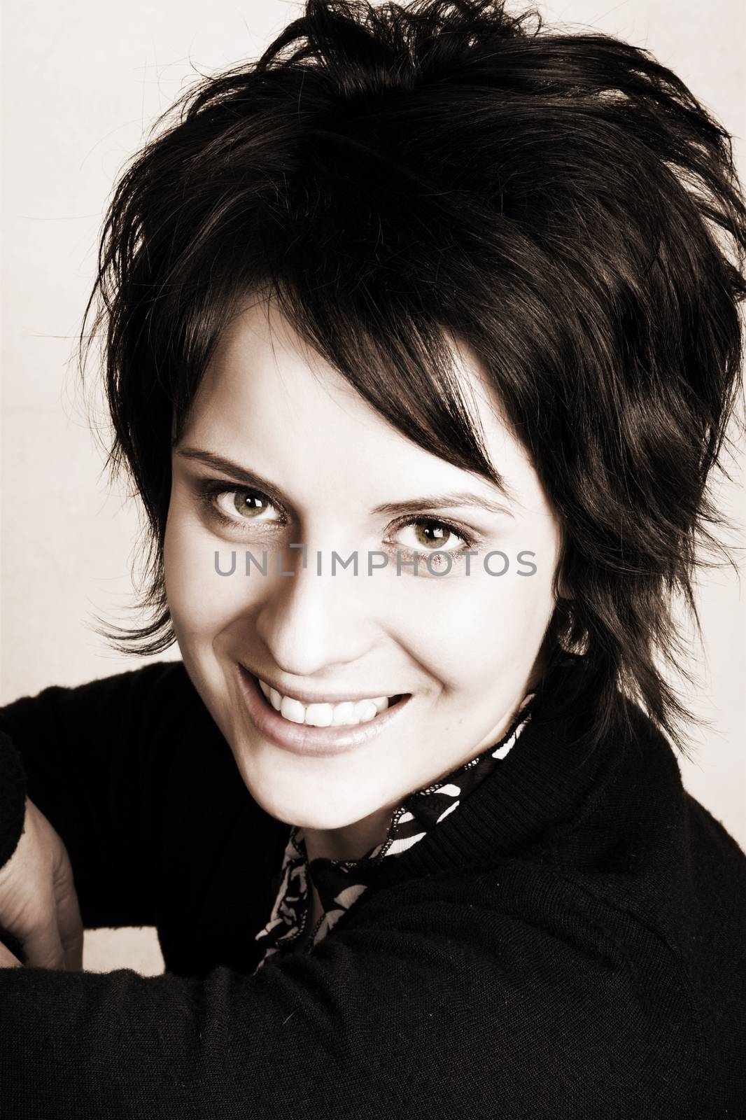 Studio shot of female brunette, head and shoulders